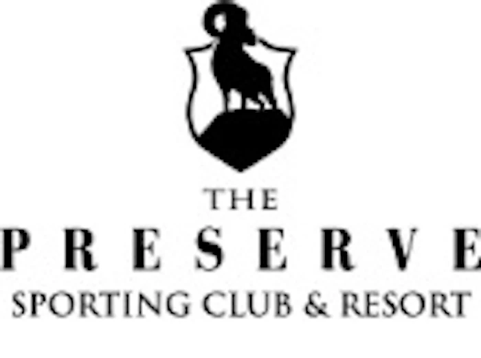 The Preserve Sporting Club & Resort logo featuring a black hunting dog emblem with text