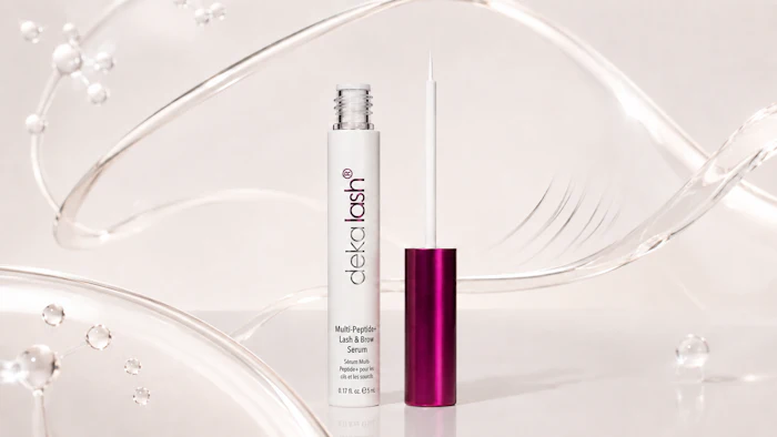 Cek Lash Multi-Peptide Lash & Brow Serum with purple cap displayed on clear gel background