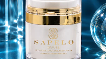 SAPELLO Infuse illuminating collagen mask jar with gold band and white lid on blue reflective surface